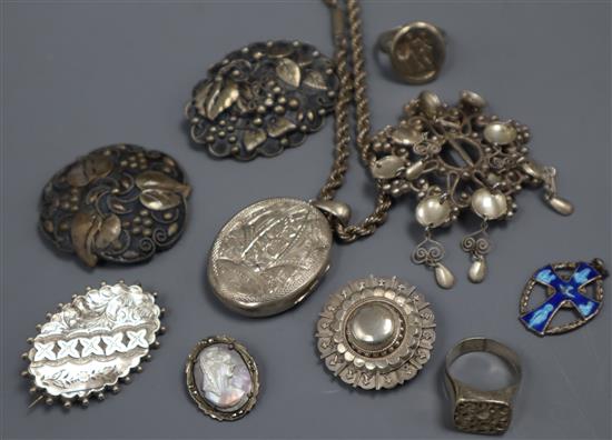 A group of mixed silver and white metal jewellery including a Victorian locket and an antique signet ring.